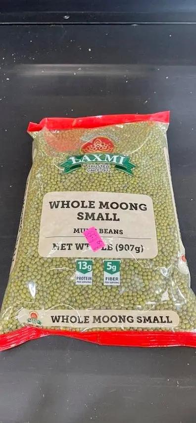 Laxmi while moong small beans by LAXMI